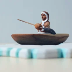 Wooden Eskimo With Canoe