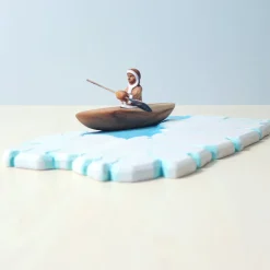 Wooden Eskimo With Canoe