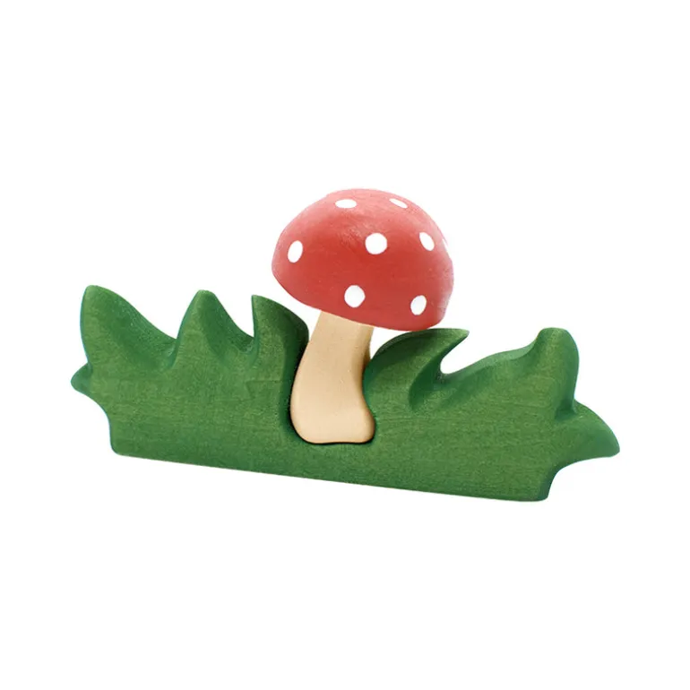 Wooden Mushroom in Grass